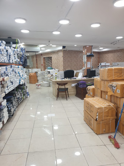 الدباسي أقمشة رجالية بالجملة -