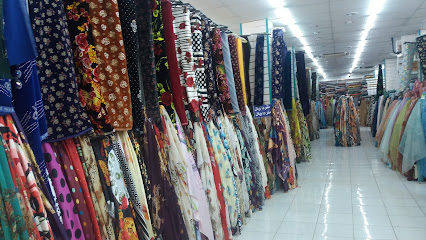 مؤسسة أضواء الجادة للأقمشة - Tabuk - +966 56 736 4569